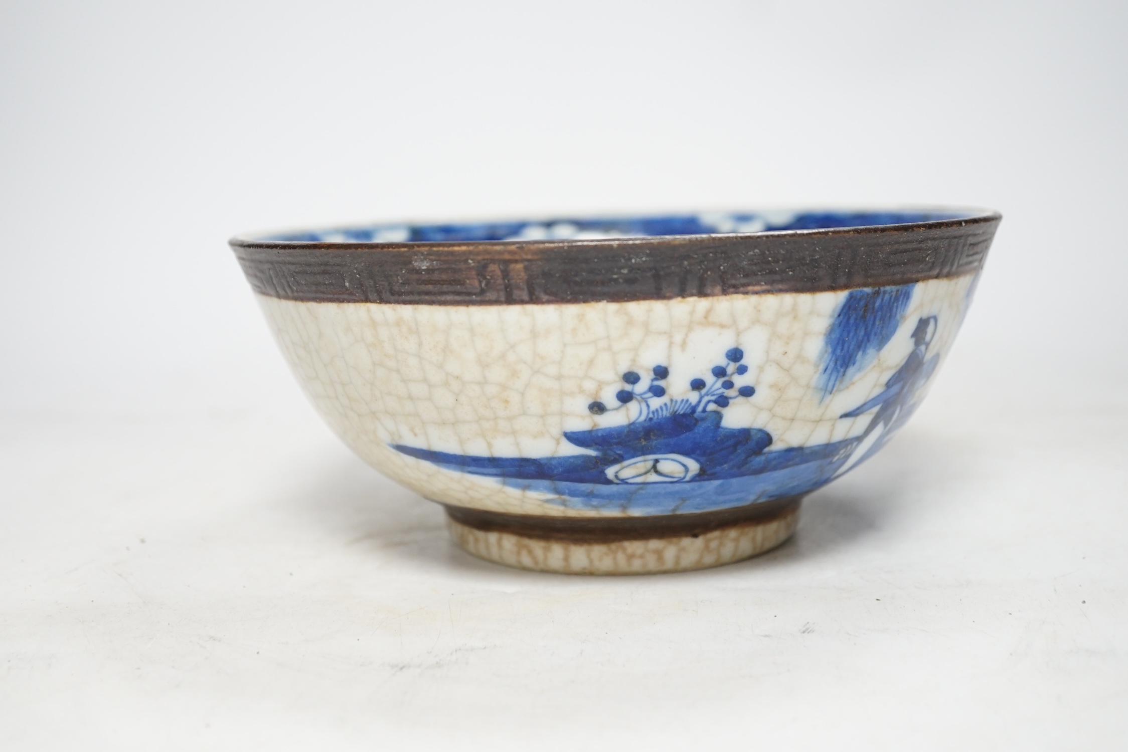 A Chinese blue and white crackle glazed bowl, early 20th century, 21cm diameter